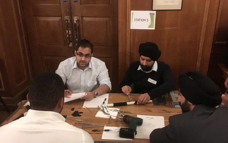 Candidates practising at an interview station